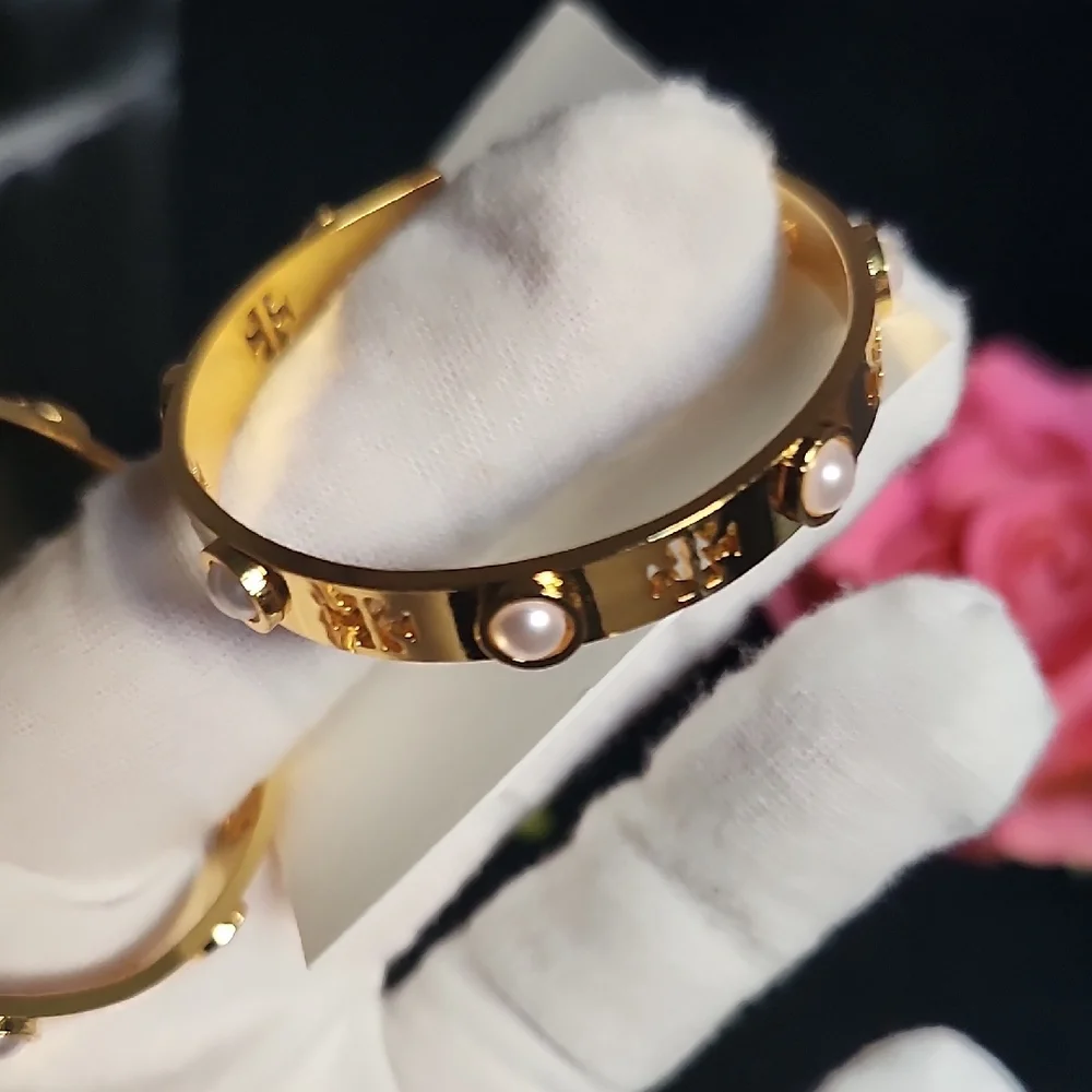 Tory Burch Gold Hoops with Pearl Accents - Picture 7 of 10